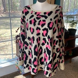Pink, leopard print, scoop neck sweater.